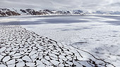 Fast ice breaking up, Svalbard, Arctic