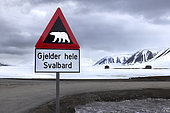 Polar bear danger sign for . Landscape of Svalbard in Norway, also known as Spitsbergen. This territory stretches from latitude 75 to 80 degrees to the pack ice a few hundred kilometers from the North Pole.