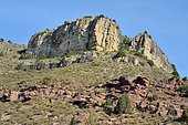 Rio Martin Natural Park: contact zone between red Triassic sandstones and yellowish limestones from the late Carboniferous, Teruel Province, Spain