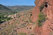 Rio Martin Natural Park: Triassic red sandstone cliffs above the village of Peñarroyas, Province of Teruel, Spain