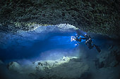 Cave diver in a karst underwater cave at a depth of 60 metres for the Gumbo La Baharini 2 expedition, Passe Bateau Sud at a depth of 60 metres, Mayotte