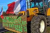 Farmers' demonstration, slogan on a tractor "Regulatory pressure is burying us!!! JA 72", Le Mans, Sarthe, France