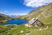 The CAF refuge (2380 m) at Vens lakes and the large upper lake (2325 m), Mercantour National Park, Alpes-Maritimes, France