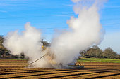 Automated steam disinfection of soil at a depth of 10-14 cm before sowing or planting. Market gardening, Gaec Seuru, Champagne, Sarthe, Pays de la Loire, France