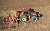 Aerial view of cereal or rapeseed sowing with a pneumatic seeder combined with a rotary harrow, France