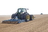 Passage of an implement train before seeding in light soils in Normandy, France