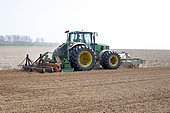 Passage of an implement train before seeding in light soils in Normandy, France