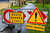 Sign on a country road, flooded road and road blocked 300 meters from Neuville sur Sarthe, France. February 26, 2024