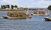 Flat-bottomed boats or barges for harvesting and transporting oyster bags to Saint Armel, Golfe du Morbihan, Southern Brittany, France.