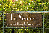 Sign for La Veules, France's shortest coastal river, Seine Maritime, Normandy, France. This sign is located in Veules-les-Roses on a small bridge that crosses the river. The river flows into the English Channel