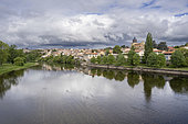 Village of Pont-du-Chateau covered by a stormy sky and the river Allier at Pont-du-Chateau, France on 26 April 2024.