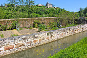 Medieval town that defied William the Conqueror, perched on a 70-metre rocky outcrop. Today, one of the most beautiful villages in France, Sainte-Suzanne is a small town full of character. River Erve feeding several mills and old wash houses, Sainte-Suzanne in Mayenne, France