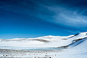 A frozen lake at the heart of a landscape near the Mario Zucchelli station. Victoria Land, Antarctica