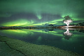 Aurora borealis over the geothermal zone of Mývatn, Iceland