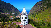 Aerial view of the Nossa Senhora de Fatima chapel and of the city of Sao Vicente. Sao Vicente. Madeira island. Portugal.