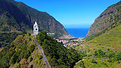 Aerial view of the Nossa Senhora de Fatima chapel and of the city of Sao Vicente. Sao Vicente. Madeira island. Portugal.