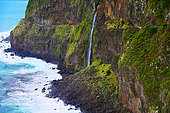 The Veu da Noiva water fall is falling into the sea. Moniz. Madeira island. Portugal.
