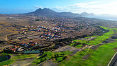 Aerial view of the Porto Santo's golf course, built in 2004 by the local government and the glf chamion Severiano Ballesteros, to promote tourism in the island, always short on water. The green is watered with waste water. Porto Santo Island. Madeira. Portugal.
