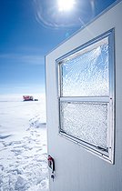 The dining tent door. The intense cold has taken its toll on the windows. Little Dome C, Antarctic Plateau, Antarctica
