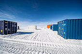 Containers on the ground are used to store drilling equipment and the insulating crates in which the ice cores will be stored. Little Dome C, Antarctic Plateau, Antarctica