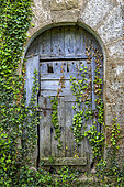 Door to an abandoned farmhouse. Agüero region, Aragon, Spain