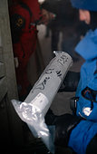 A scientist comes to retrieve an ice core stored in an underground cellar. These ice cores contain the climate archives of the past. These cores allow us to reconstruct the climate of the last 800,000 years. Concordia Antarctic Research Station, Dome C plateau, East Antarctica.