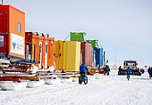 Personnel busy around the Raid convoy. Concordia Antarctic Research Station, Dome C plateau, East Antarctica.
