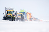 The Raid convoy leaves Concordia for the Robert Guillard Station. Concordia Antarctic Research Station, Dome C plateau, East Antarctica.