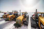 These Raid drivers have just parked their machines after a day of logistics at Concordia Station. Concordia Antarctic Research Station, Dome C plateau, East Antarctica.