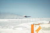 The Basler takes off from the Concordia runway. This run has been the same for 30 years. It is regularly groomed during the summer season to ensure that the snow retains its hardness. Concordia Antarctic Research Station, Dome C plateau, East Antarctica.