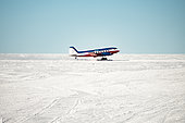 The Basler takes off from the Concordia runway. Concordia Antarctic Research Station, Dome C plateau, East Antarctica.
