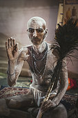 Kumbh Mela 2025: The Sacred Goes Viral. The Naga Sadhus: Guardians of the Kumbh Mela. At the Maha Kumbh Mela, the Naga Sadhus stand as powerful symbols of asceticism and strength. With their distinctive appearance, clad in nothing but ash, with dreadlocked hair and intense spiritual focus, they greet pilgrims with both grace and authority. As the faithful approach, offering their donations, the Naga Sadhus accept them not for material gain but as a reminder of the sacred cycle of giving. These ascetics, who have renounced all worldly attachments, embody the spirit of selflessness and spiritual devotion, welcoming the pilgrims in their journey to purification and enlightenment.