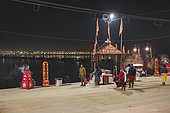 Kumbh Mela 2025: The Sacred Goes Viral. Crossing the Sacred Waters. Pilgrims on the Floating Bridges of the Kumbh Mela. As millions of pilgrims arrive at the Maha Kumbh Mela, the floating bridges serve as vital passages over the holy Ganges River. Walking across these makeshift structures, pilgrims are not just crossing water—they are crossing into a deeper spiritual realm. The path is lined with devotion, as each step brings them closer to purification and peace. These bridges, built to withstand the immense flow of people, represent both the physical and spiritual journeys that define the Kumbh Mela, where faith and resilience merge on the sacred waters.