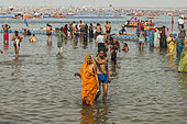 Kumbh Mela 2025: The Sacred Goes Viral. The Sacred Bath. At the Kumbh Mela, thousands of pilgrims gather at the Sangam, the sacred confluence of the Ganges, Yamuna, and the mythical Sarasvati rivers, to perform the ancient ritual of the sacred bath. The water, believed to purify the soul and wash away sins, is a central part of this spiritual journey. As the pilgrims immerse themselves in the holy waters, they are united in their devotion and faith, embodying the collective spirit of the festival. The sacred bath is more than just a physical cleansing, it is a moment of spiritual awakening, a renewal of faith, and a step toward liberation. The scene is filled with a sense of serenity and reverence, as people from all walks of life come together in this timeless act of devotion.