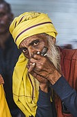 Kumbh Mela 2025: The Sacred Goes Viral. Sadhus Smoking Chilum in Their Tents. Sadhus Relaxing and Smoking Chilum in Their Tents at the Kumbh Mela. Inside their humble tents at the Kumbh Mela, a group of sadhus smoke chilum, a traditional pipe used in their spiritual practice. The chilum, filled with tobacco or cannabis, is often smoked during meditative or ritual moments, connecting the sadhus to higher states of consciousness. As they sit in their tents, surrounded by the sacred atmosphere of the festival, the sadhus remain focused on their spiritual journey. The act of smoking, though often seen as a moment of relaxation, is intertwined with their ascetic lifestyle, where inner peace is sought through solitude, prayer, and reflection. The scene reflects the unique spiritual practices that are part of the rich tapestry of the Kumbh Mela, where devotion takes many forms.