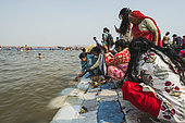 Kumbh Mela 2025: The Sacred Goes Viral. The Sacred Bath at the Sangam. At the Kumbh Mela, thousands of pilgrims gather at the Sangam, the sacred confluence of the Ganges, Yamuna, and the mythical Sarasvati rivers, to perform the ancient ritual of the sacred bath. The water, believed to purify the soul and wash away sins, is a central part of this spiritual journey. As the pilgrims immerse themselves in the holy waters, they are united in their devotion and faith, embodying the collective spirit of the festival. The sacred bath is more than just a physical cleansing, it is a moment of spiritual awakening, a renewal of faith, and a step toward liberation. The scene is filled with a sense of serenity and reverence, as people from all walks of life come together in this timeless act of devotion.