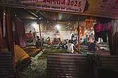 Kumbh Mela 2025: The Sacred Goes Viral. The Naga Sadhus: Guardians of the Kumbh Mela. At the Maha Kumbh Mela, the Naga Sadhus stand as powerful symbols of asceticism and strength. With their distinctive appearance, clad in nothing but ash, with dreadlocked hair and intense spiritual focus, they greet pilgrims with both grace and authority. As the faithful approach, offering their donations, the Naga Sadhus accept them not for material gain but as a reminder of the sacred cycle of giving. These ascetics, who have renounced all worldly attachments, embody the spirit of selflessness and spiritual devotion, welcoming the pilgrims in their journey to purification and enlightenment.