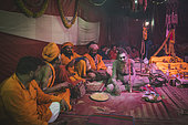 Kumbh Mela 2025: The Sacred Goes Viral. The Naga Sadhus: Guardians of the Kumbh Mela. At the Maha Kumbh Mela, the Naga Sadhus stand as powerful symbols of asceticism and strength. With their distinctive appearance, clad in nothing but ash, with dreadlocked hair and intense spiritual focus, they greet pilgrims with both grace and authority. As the faithful approach, offering their donations, the Naga Sadhus accept them not for material gain but as a reminder of the sacred cycle of giving. These ascetics, who have renounced all worldly attachments, embody the spirit of selflessness and spiritual devotion, welcoming the pilgrims in their journey to purification and enlightenment.