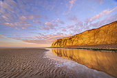 Cap Blanc-Nez cliff reflected in the water at golden hour, Opal Coast, France
