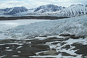 Ice tongue and melt lake in June in Spitsbergen, Svallbard Archipelago