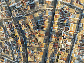 Streets and rooftops in the White Town of Olvera. Aerial view. Drone shot. Cádiz province, Andalusia, Spain.