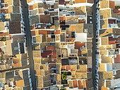 Streets and rooftops in the White Town of Olvera. Aerial view. Drone shot. Cádiz province, Andalusia, Spain.