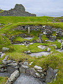 Jarlshof, an archaological site with buildings from the neolithic to the middle ages. Houses used during bronze age or early iron age. Europe, Northern Europe, Great Britain, Scotland