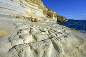 Calcarenite cliffs in the Cabo de Gata Geopark, Andalusia. Bioclastic deposits of around 6 Ma - Rodalquilar sector, Cabo de Gata Geopark, southern Spain