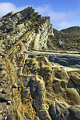 Flysch in the Tabernas Desert, Andalusia (Spain). Alternating sandstones and marls deposited in the Miocene (- 8 Ma) in a sedimentary basin at the foot of the Sierra Nevada, then folded and straightened by recent tectonics. The arid climate of the Tabernas makes it Europe's only desert, expanding as a result of the increasing drought in southern Spain.