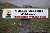 Alsace Stork Village sign, entrance to the village, Herrlisheim pres Colmar, Haut Rhin, France