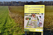 Educational panel on the planting of hedgerows between fields by hunters, Finistère, Brittany, France