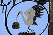 Sign to a bakery pastry shop, stork with a kougelhopf, Kaysersberg, Haut Rhin, France