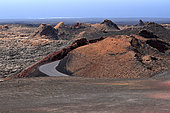 Islet Hilario in Timanfaya National Park and view of the volcanoes, Lanzarote Island, Canary Islands