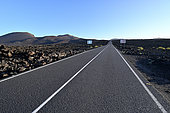 Road LZ-67 outside the village of Yaiza through Timanfaya National Park, Lanzarote Island, Canary Islands